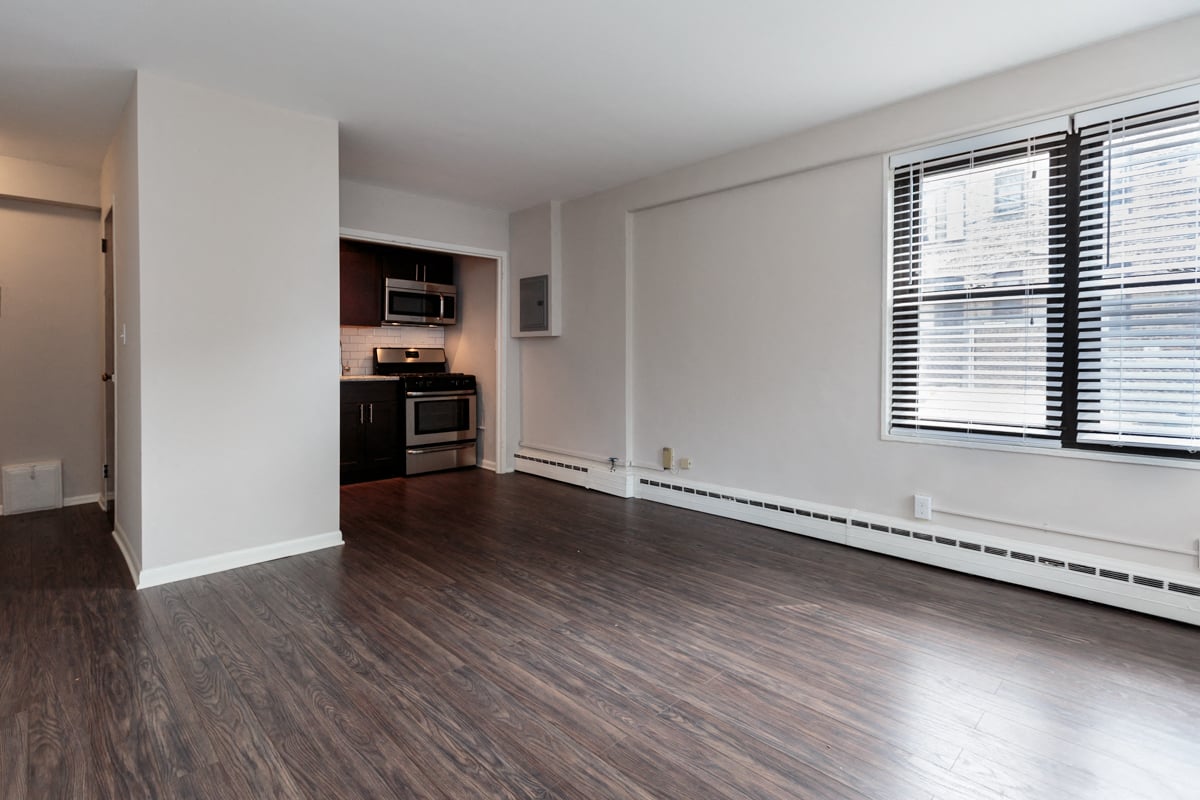 kitchen dining room home renovated hardwood floors stainless steel appliances